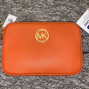 Orange Michael kors crossbody bag